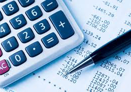 Calculator and pen on a financial statement